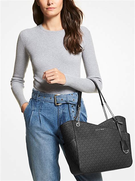 jet set large logo bag michael kors|Michael Kors jet set airplane.